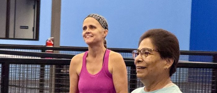 2 ladies enjoying pickleball